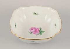 Meissen, Germany. Large porcelain bowl with a motif of a pink rose.