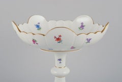 Meissen, Germany. Large porcelain centerpiece. Polychrome floral motifs.