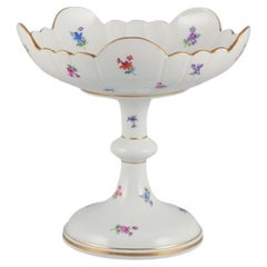 Meissen, Germany. Large porcelain centerpiece. Polychrome floral motifs.