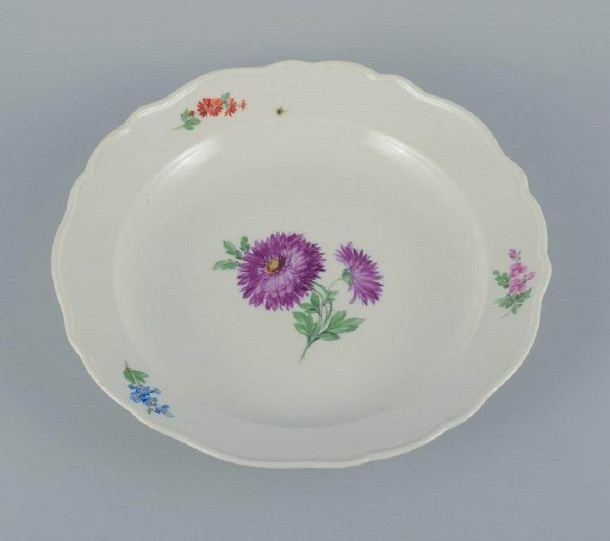 Meissen, Germany, large round serving dish.
Hand painted with floral motifs in different colours.
circa 1900.
In excellent condition.
Third factory quality.
Approx. 1900.
Dimensions: D 31.5 x H 5.5 cm.