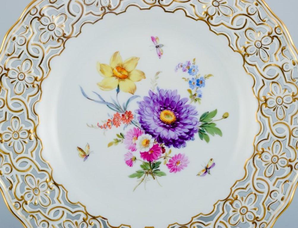 Meissen, Germany, openwork plate hand-painted with flowers and butterflies.
Wide openwork with gold decoration.
Early 20th century.
Perfect condition. Seemingly unused.
First factory quality.
Marked.
Dimensions: D 21.0 cm.





