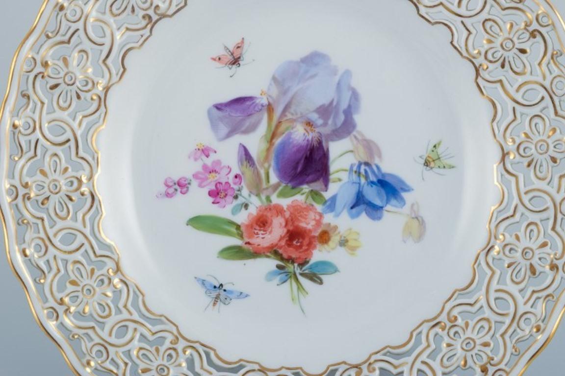 Meissen, Germany, openwork porcelain plate hand painted with flowers and butterflies.
Wide openwork with gold decoration.
Early 20th century.
Perfect condition. Seemingly unused.
First factory quality.
Marked.
Dimensions: D 21.0 cm.