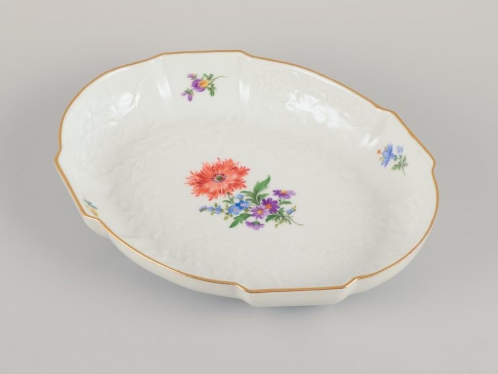 Meissen, Germany. Oval porcelain bowl hand-painted with polychrome flowers. In Excellent Condition In Copenhagen, DK