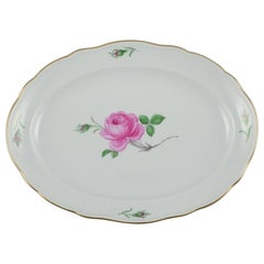 Meissen, Germany. Oval Porcelain Dish Decorated with Pink Rose. Approx. 1930s.
