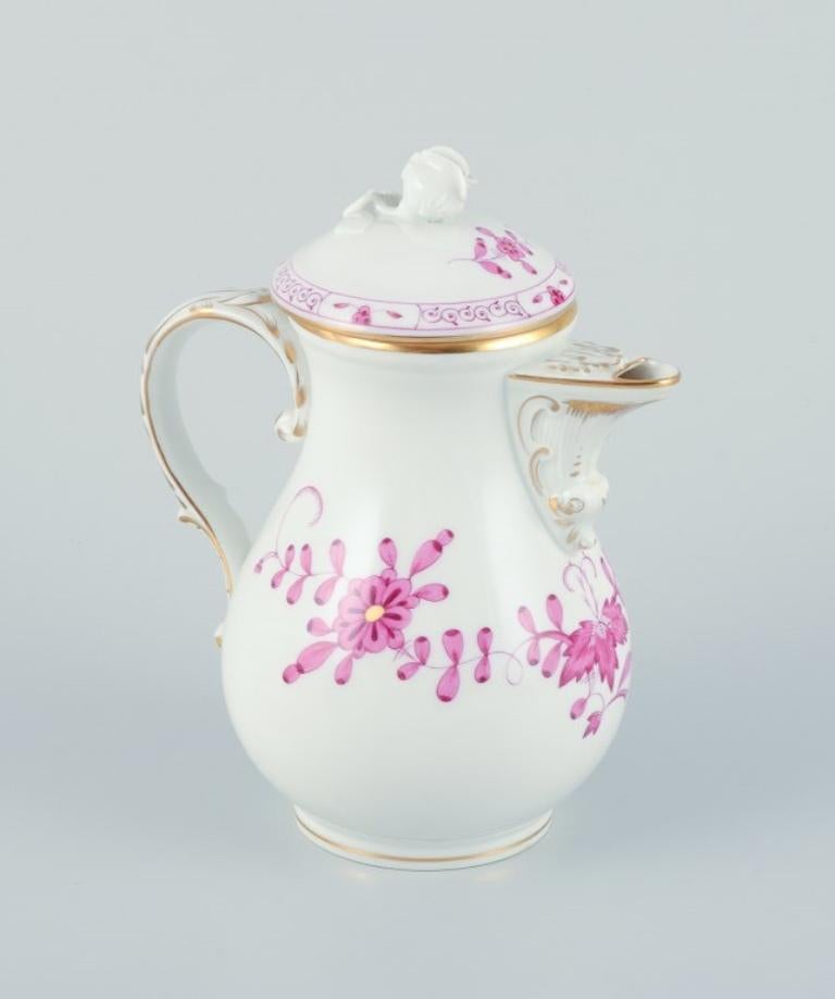 Meissen, Germany,  Pink Indian. Porcelain mocha (demitasse) pot.
Hand-painted.
Approximately from the 1930s.
Marked.
Perfect condition.
Third factory quality.
Dimensions: H 16.0 cm x D 13.5 including handle and spout.
