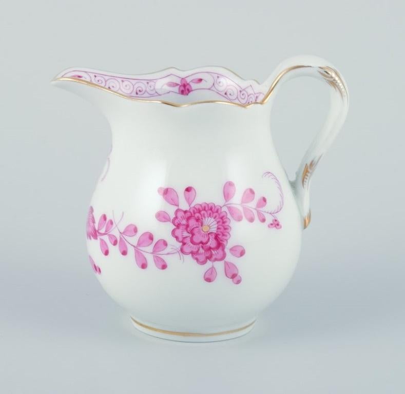 Meissen, Germany. Pink Indian sugar bowl and creamer in hand-painted porcelain.
Approximately from the 1930s.
Marked.
Perfect condition.
Third factory quality.
Creamer: D 7.5 cm x H 7.5 cm including handle and spout.
Sugar bowl: H 5.5 cm x D 7.2 cm.
