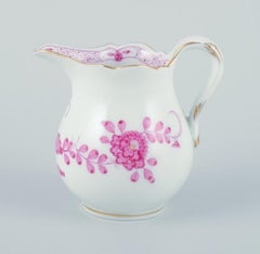 Meissen, Germany. Pink Indian sugar bowl and creamer in hand-painted porcelain.