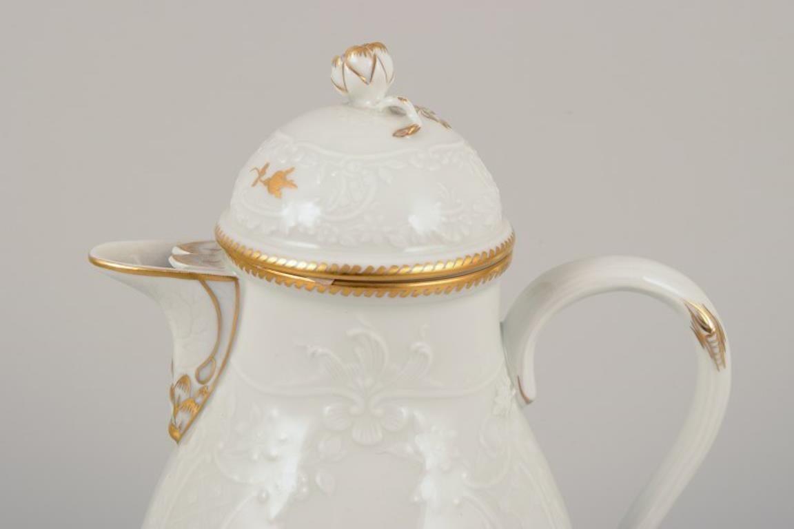 Meissen, Germany.  Porcelain coffee set: coffee pot, creamer, sugar bowl. In Excellent Condition For Sale In Copenhagen, DK