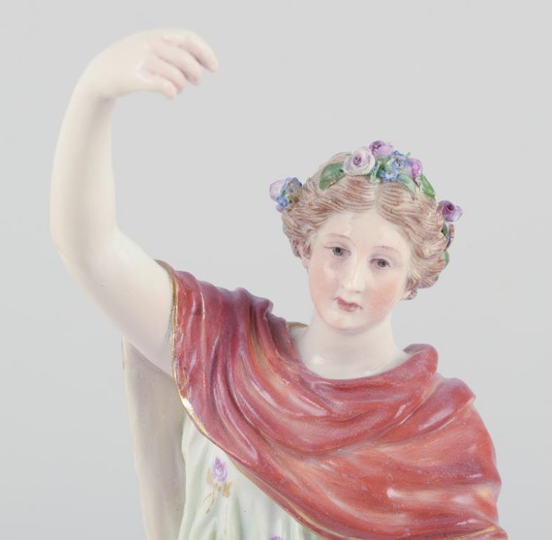 Meissen, Germany.
Porcelain figure of Flora with flower wreath in hair.
Overglaze technic.
Dating: Late 1800s.
Marked and with model number.
In excellent condition.
Dimensions: H 22.5 cm. x W 7.0 cm.