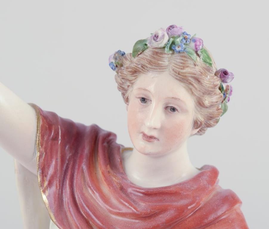 Glazed Meissen, Germany. Porcelain figure of Flora with flower wreath in hair. For Sale