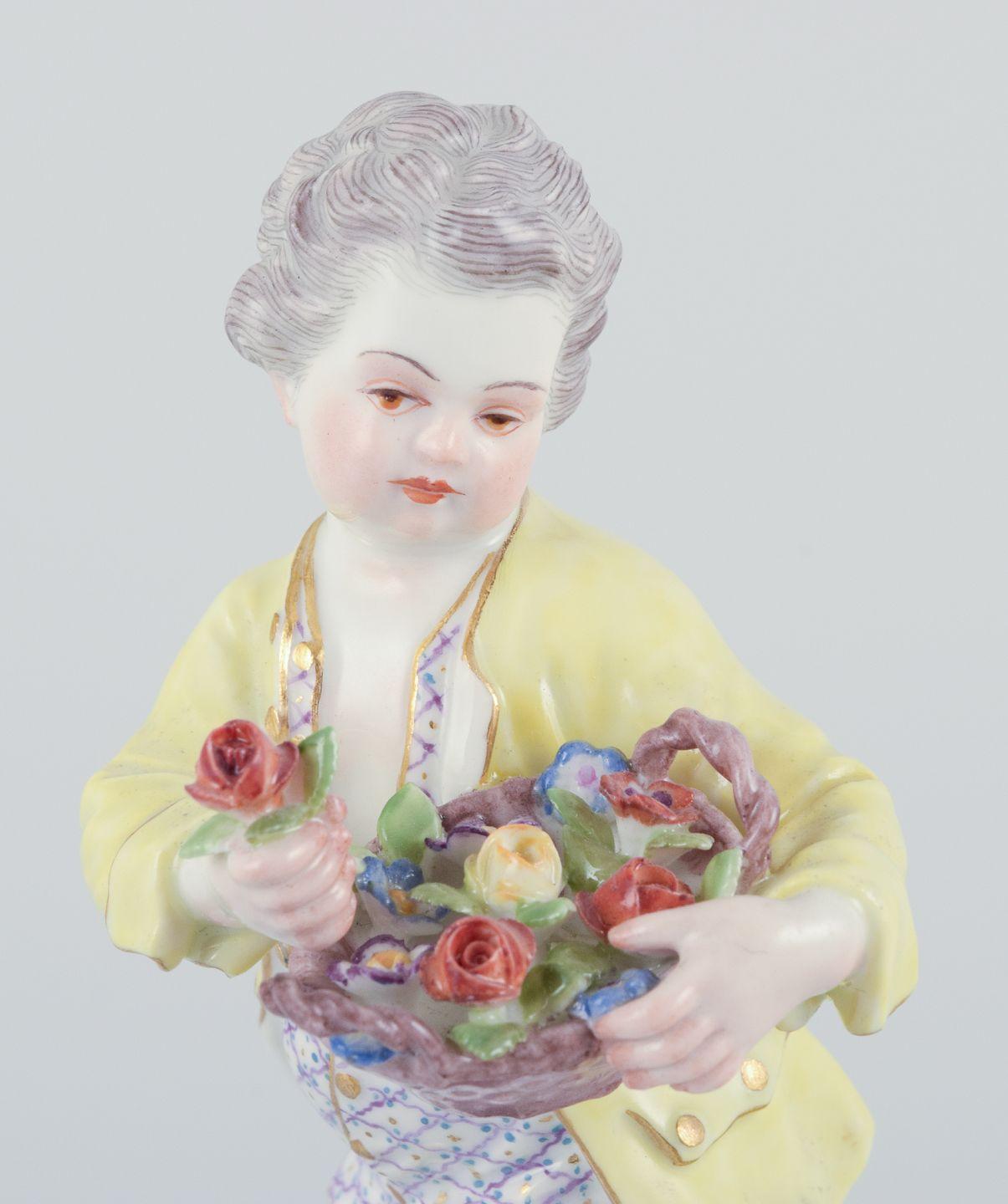 Pre-owned goods are exempt from import duties for U.S. customers. 
Therefore, no import tariffs will be applicable to your purchase.

Meissen, Germany. Porcelain figurine of boy with basket of flowers.
Polychrome overglaze.
Model 1507
Dating: Ca.