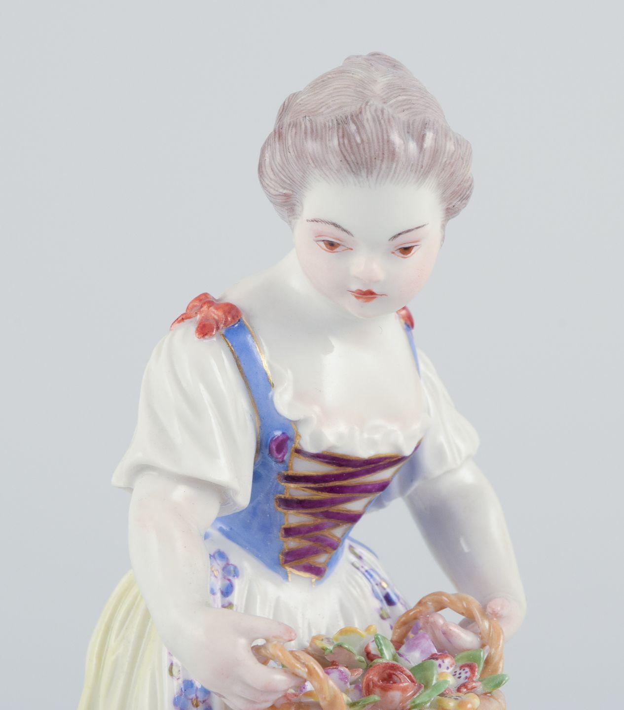 Pre-owned goods are exempt from import duties for U.S. customers. 
Therefore, no import tariffs will be applicable to your purchase.

Meissen, Germany. Porcelain figurine of girl with basket.
Polychrome overglaze.
Model 1507
Dating: Ca.