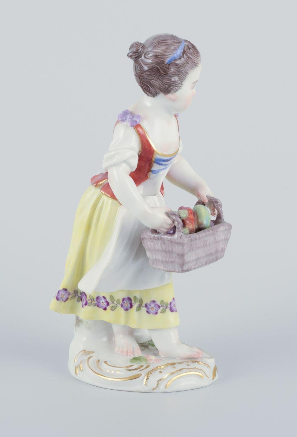 Rococo Revival Meissen, Germany. Porcelain figurine of girl with basket. Ca 1900 For Sale