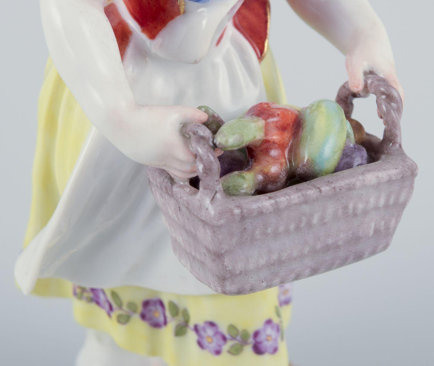 Meissen, Germany. Porcelain figurine of girl with basket. Ca 1900 For Sale 1