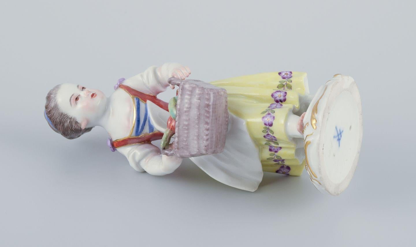 Meissen, Germany. Porcelain figurine of girl with basket. Ca 1900 For Sale 2