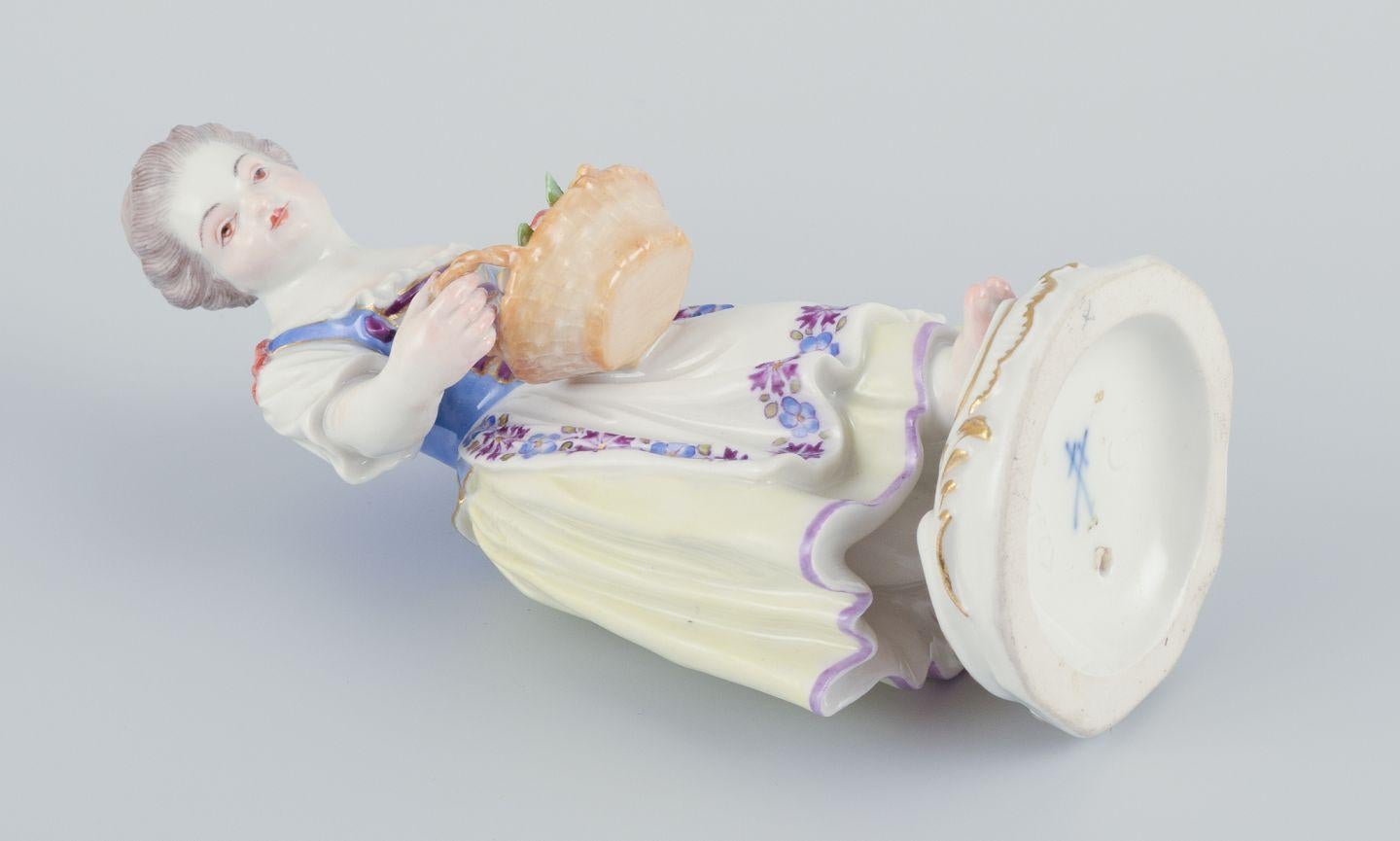 Meissen, Germany. Porcelain figurine of girl with basket. Ca 1900 For Sale 2