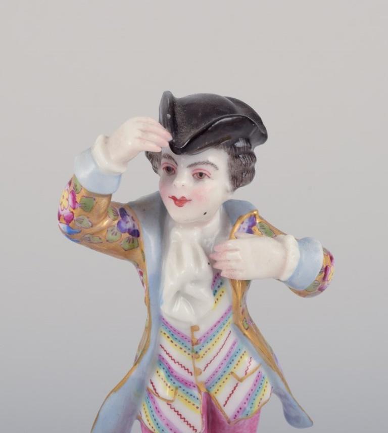 19th Century Meissen, Germany. Porcelain figurine of young man in elegant attire. For Sale