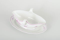 Meissen, Germany. Porcelain sauce boat with lilac floral motif. 1930s
