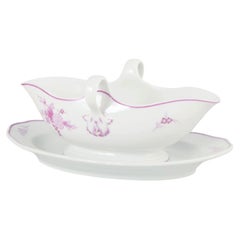Meissen, Germany. Porcelain sauce boat with lilac floral motif. 1930s