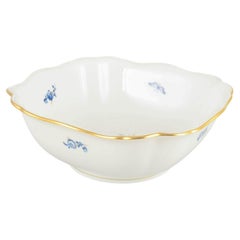 Meissen, Germany. Porcelain square bowl with blue floral motifs and gilt edge.
