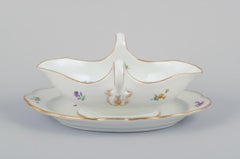 Meissen, Germany, sauce boat on foot. Hand-painted with polychrome floral motifs
