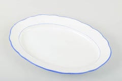 Meissen, Germany. Serving platter in white-glazed porcelain with blue trim.
