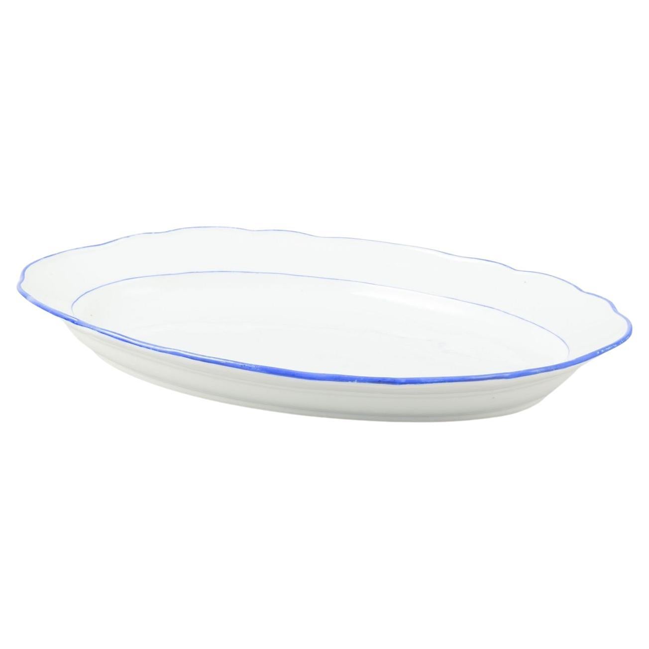 Meissen, Germany. Serving platter in white-glazed porcelain with blue trim.