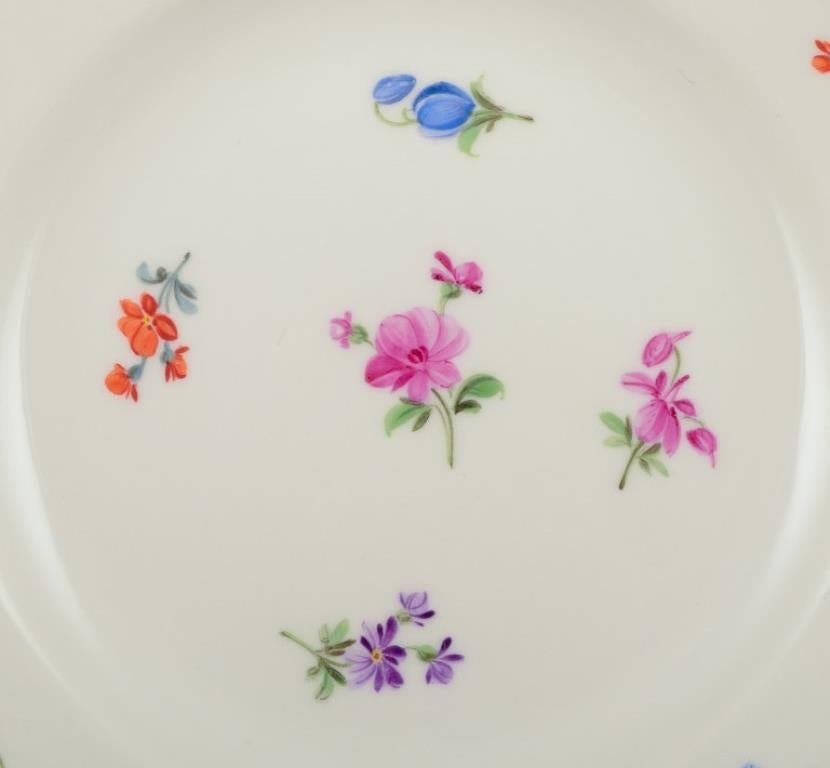 Meissen, Alemania. Conjunto de once platos pequeños de porcelana. Alemán