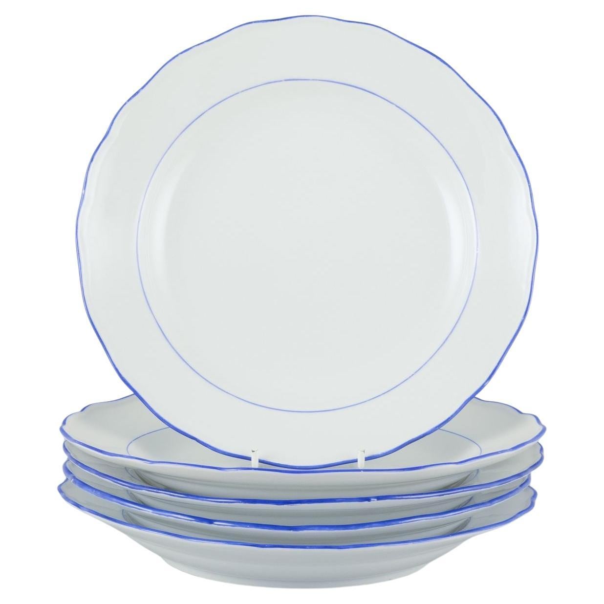 Meissen, Germany. Set of five dinner plates. White porcelain with blue rim. For Sale
