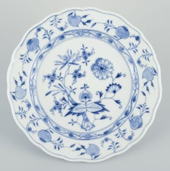 Meissen, Germany. Set of four Blue Onion patterned porcelain plates.
