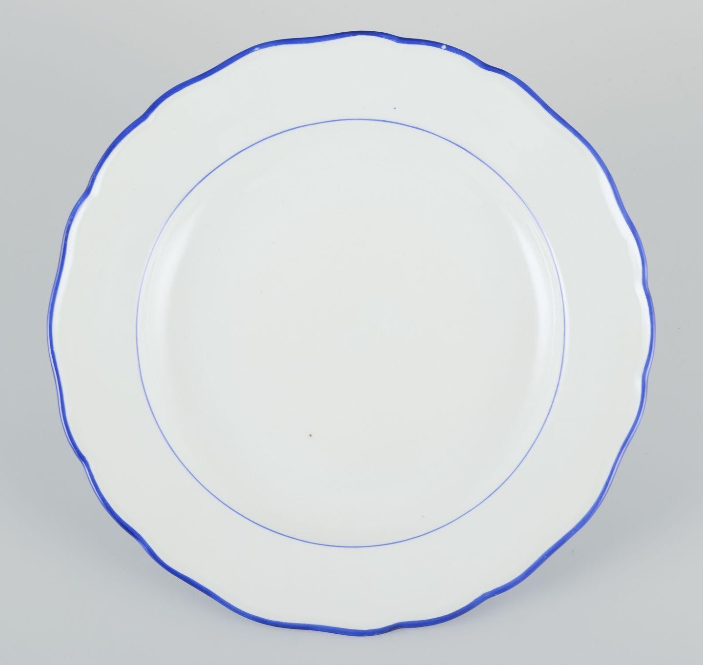 PRE-OWNED GOODS ARE EXEMPT FROM IMPORT TARIFFS FOR U.S., UK, AUSTRALIAN & CANADIAN CUSTOMERS.   
THEREFORE, NO IMPORT TARIFFS WILL BE APPLICABLE TO YOUR PURCHASE. 

Meissen, Germany. A set of four dinner plates.
White porcelain with blue rim.
Early