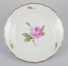 Meissen, Germany. Set of four "Pink Rose" deep dinner plates. Approx. 1930s