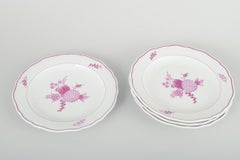 Meissen, Germany. Set of four porcelain lunch plates with lilac floral motif.
