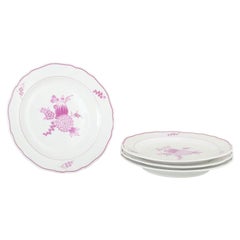 Meissen, Germany. Set of four porcelain lunch plates with lilac floral motif.
