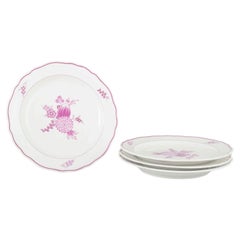 Meissen, Germany. Set of four porcelain lunch plates with lilac floral motif.