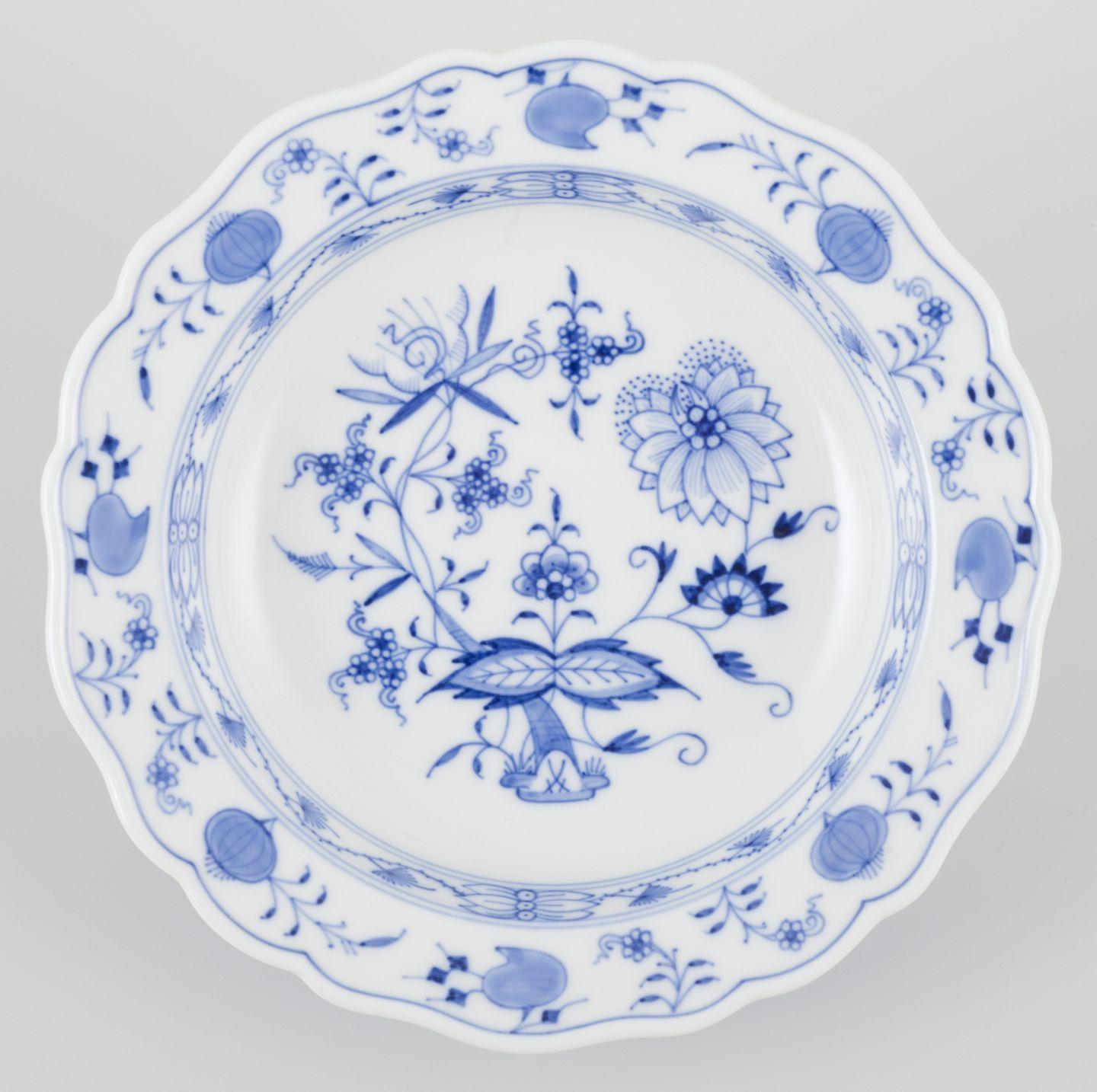 Glazed Meissen, Germany. Set of four small Blue Onion pattern porcelain plates. For Sale