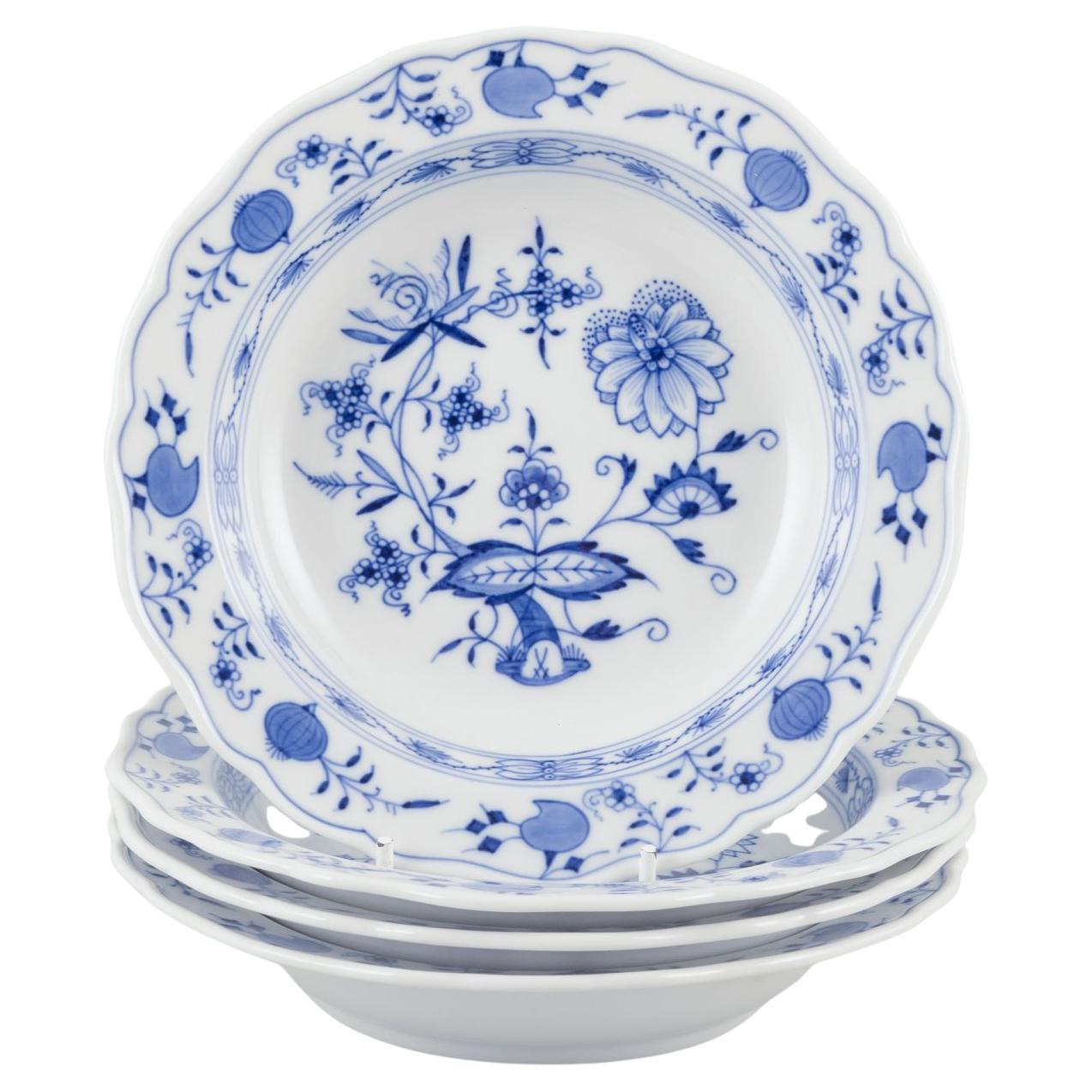 Meissen, Germany. Set of four small Blue Onion pattern porcelain plates.