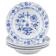 Meissen, Germany. Set of four small Blue Onion pattern porcelain plates.