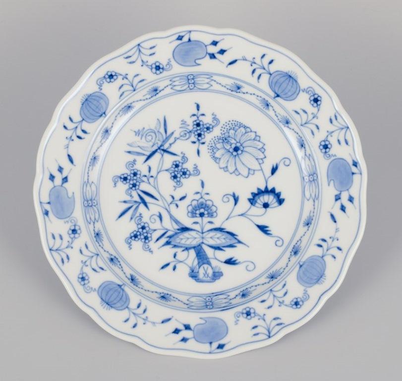 Hand-Painted Meissen, Germany. Set of seven Blue Onion pattern dinner plates. 