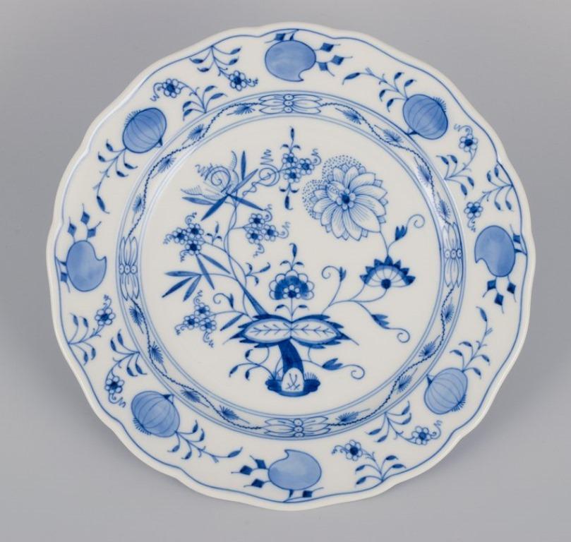 Porcelain Meissen, Germany. Set of seven Blue Onion pattern dinner plates. 