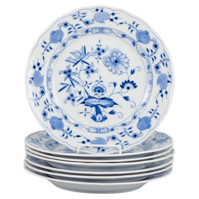 Meissen, Germany. Set of seven Blue Onion pattern dinner plates. 