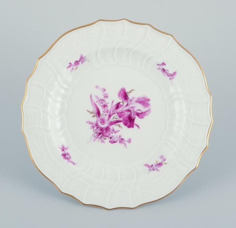 Porcelain Meissen, Germany. Set of seven porcelain plates hand-painted with purple flowers For Sale