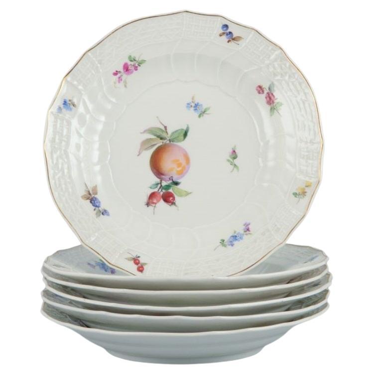 Meissen, Germany. Set of six antique deep porcelain dinner plates.