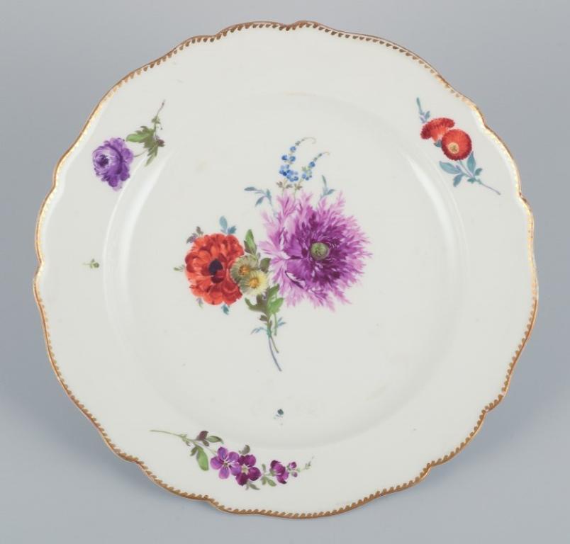 Meissen, Germany. A set of six antique porcelain dinner plates. 
Hand-painted with polychrome floral motifs.
Dating: circa 1800.
Marked with the Marcolini mark.
First factory quality.
In excellent condition with minimal signs of use. 
Dimensions: