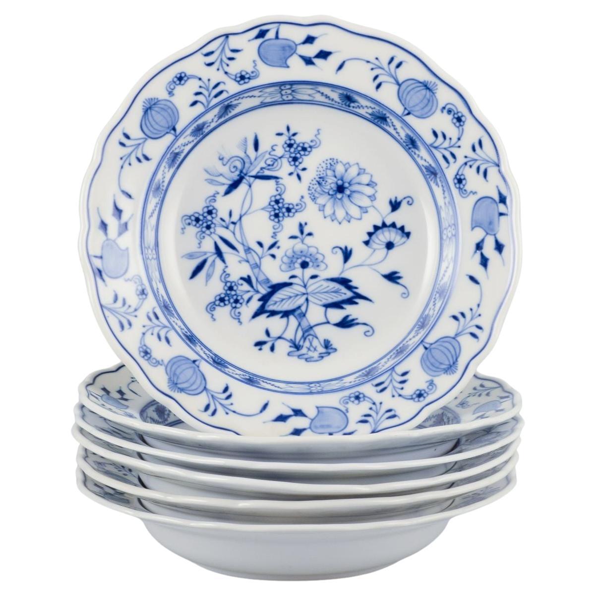 Meissen, Germany. Set of six deep porcelain plates with "Blue Onion" pattern.