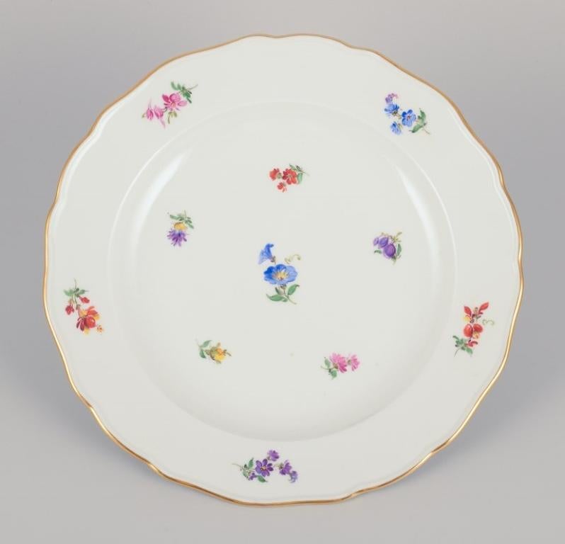 Meissen, Germany. A set of six dinner plates in porcelain, hand-painted with different polychrome flower motifs and a gold rim.
Early 1900s.
Marked.
First factory quality.
In perfect condition.
Dimensions: Diameter 24.6 cm x Height 3.5 cm.