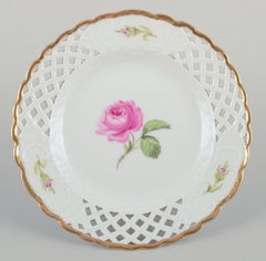 Meissen, Germany. Set of six "Pink Rose" reticulated plates. Approx. 1930s