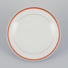 Meissen, Germany. Set of six plates. Orange and gold-decorated rim. 1930/1940s