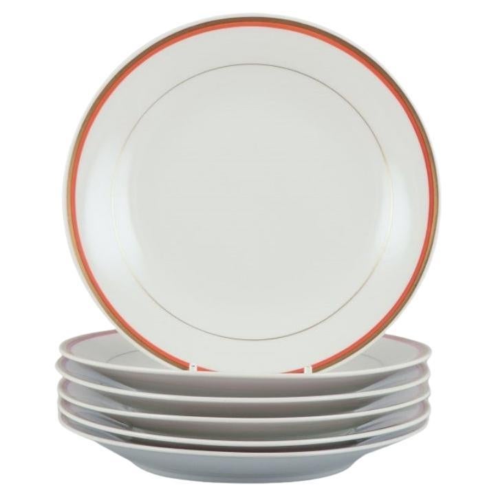 Meissen, Germany. Set of six plates. Orange and gold-decorated rim. 1930/1940s