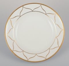 Meissen, Germany. Set of six plates. White porcelain with gold decoration.
